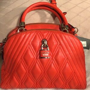 New with tags Guess handbag in color tomato. Purchased from Macy’s retails $240.